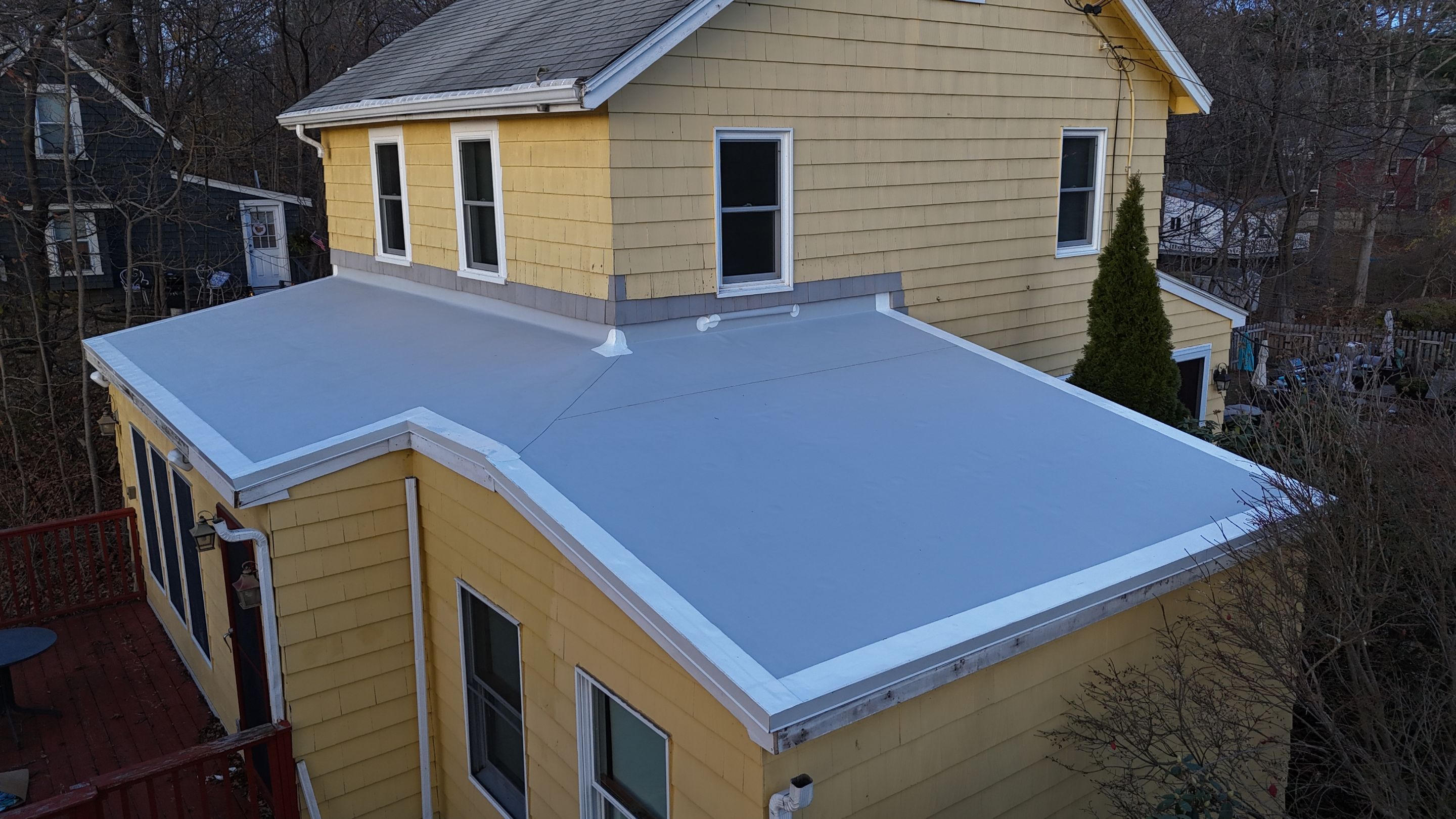 After Flat Roof in Wayland, MA - Shingle to TPO Roof Conversion